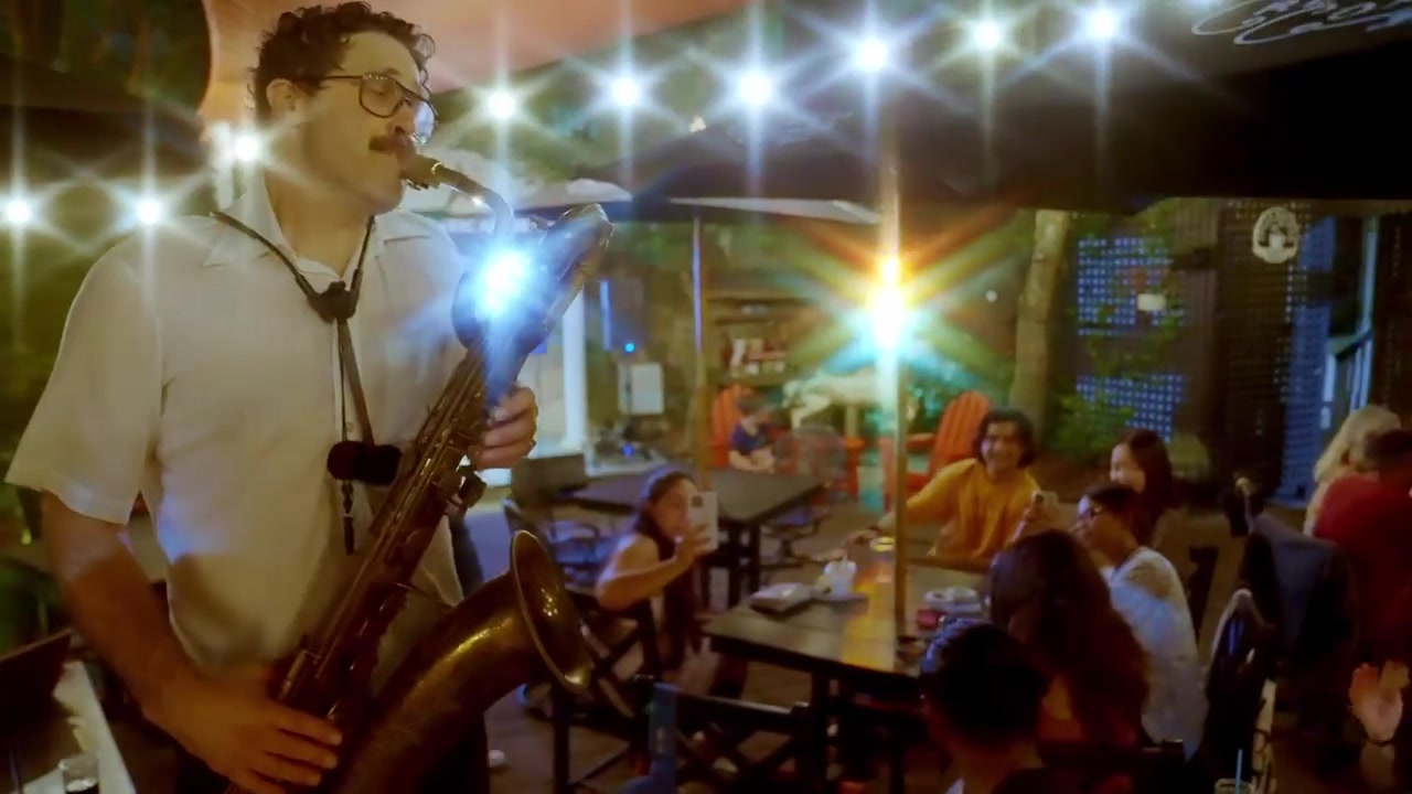 Noah Tabakin performing live on baritone saxophone